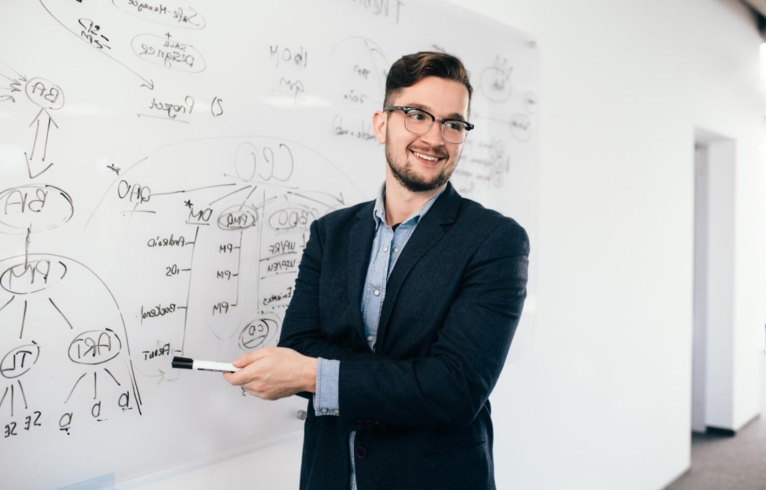 Professional financial consultation meeting with budget analysis documents and charts