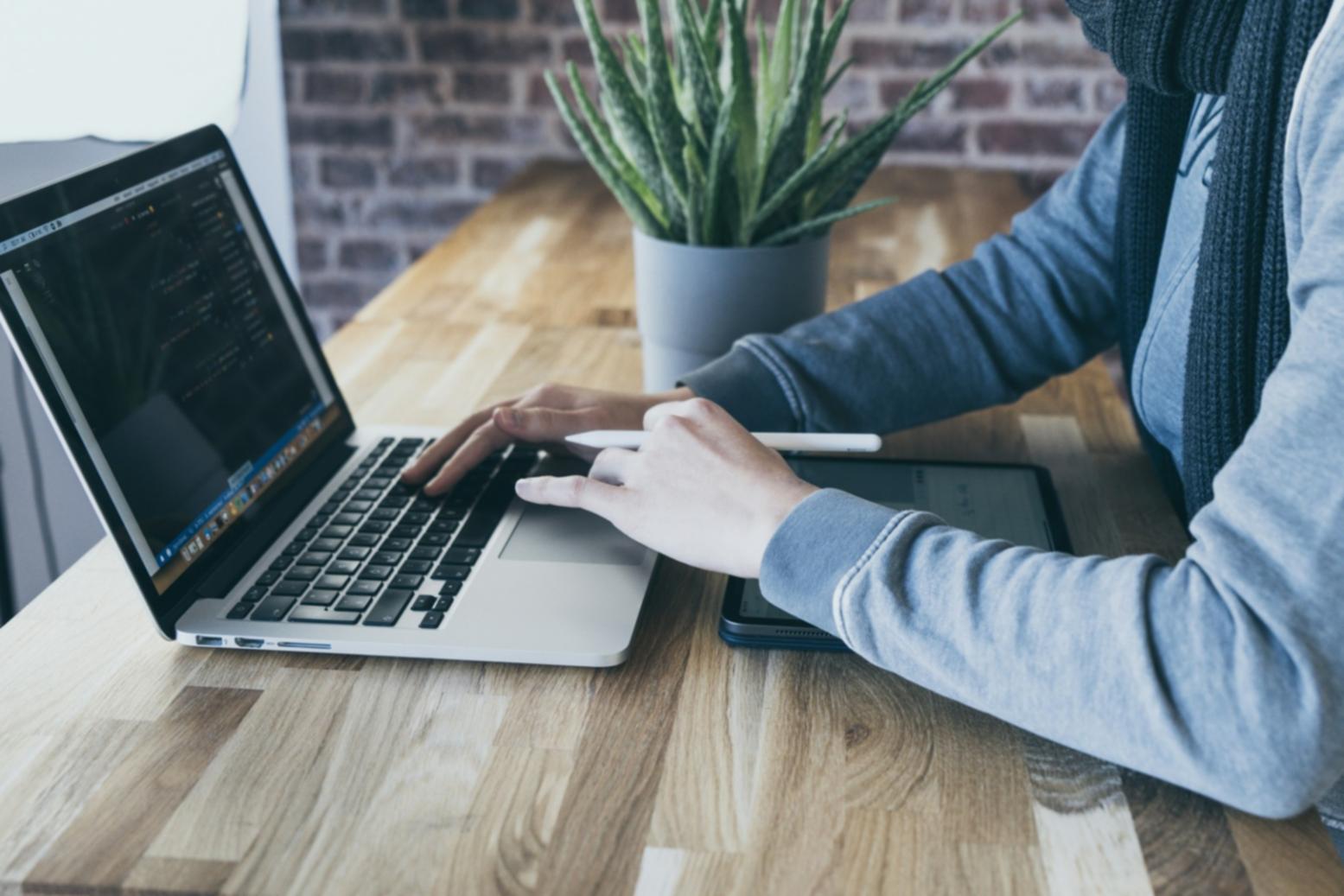 Financial analyst reviewing budget reports and risk assessment documents