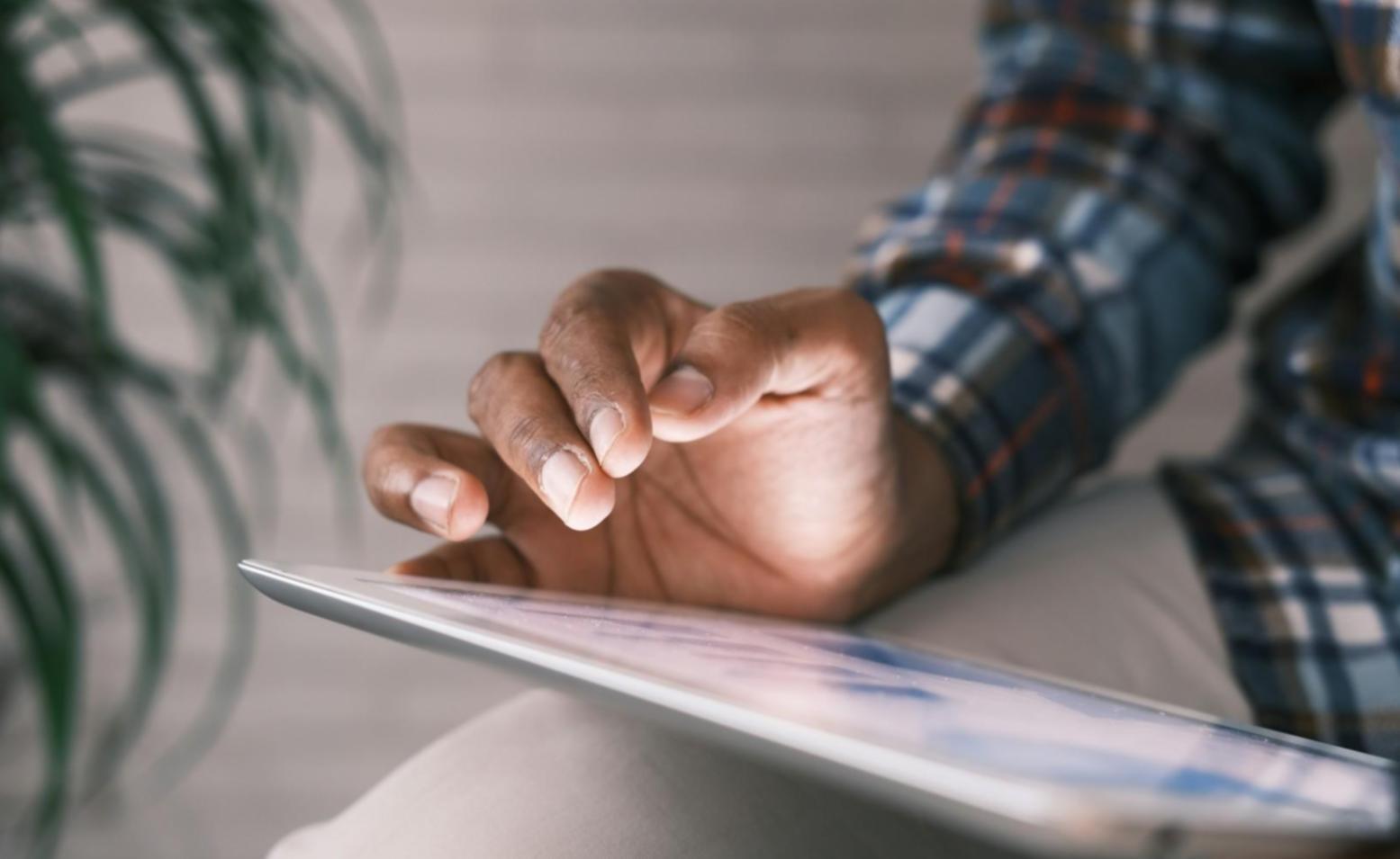 Professional analyzing budget risk data on computer screen